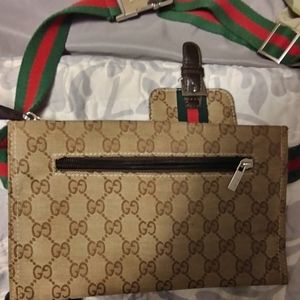 Gucci bag authentication label on the button and one strap broke but was fixed